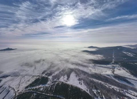 Aerial shot over the clouds while sunrise sky. Foto stock