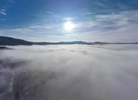 Aerial shot over the clouds while sunrise sky. Foto stock
