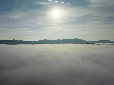 Aerial shot over the clouds while sunrise sky. Foto stock