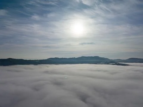Aerial shot over the clouds while sunrise sky. Foto stock