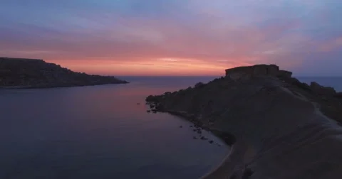 Aerial shot over a hill during Sunset Stock Footage 67155550