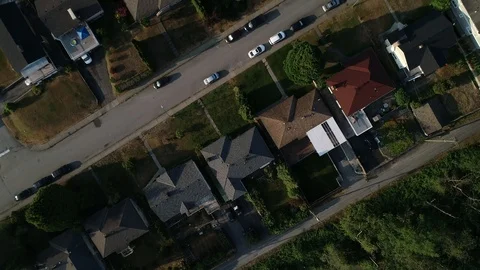 Aerial Shot Over Middle Class Residential Area On A Sunny Day Stock Footage 99940014