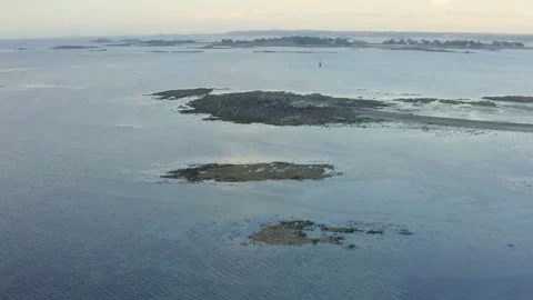Aerial shot over the ocean going towards the peninsulas, in Brittany, France Stock Footage 195238655