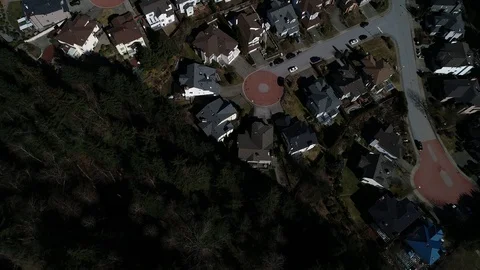 Aerial Shot Over Quaint West Coast Neighborhood Surrounded By Nature Stock Footage