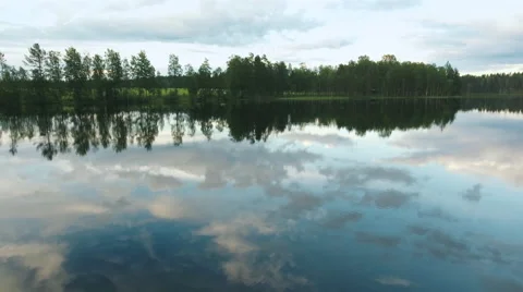 Aerial Shot over Smooth Surface of the Lake Stock Footage 65246951