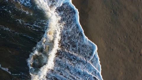 Aerial Shot over wave close up - golden hour Stock Footage 161592258