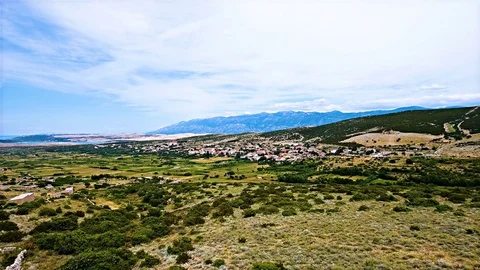 Aerial shot of Pag island with old town Kolan 4K Stock Footage