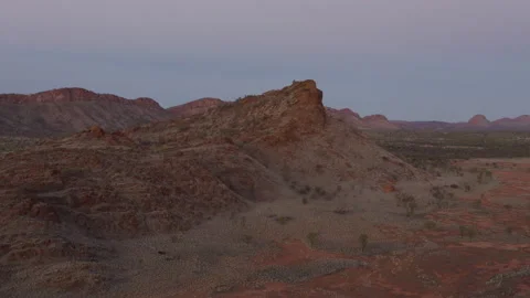 Aerial shot panning left of red colored hills Stock Footage 191077000