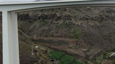 Aerial shot passing through the Silva bridge Stock Footage 245653631