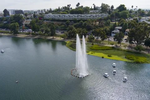 Aerial shot of a people in pedal boats on the green waters of Echo Park Lak.. Stock Photos