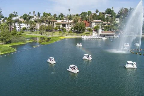 Aerial shot of a people in pedal boats on the green waters of Echo Park Lak.. Stock Photos