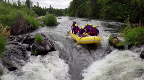 Aerial shot of people white water rafting on Rouge River, Oregon Stock Footage