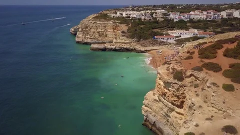 Aerial shot of Praia de Benagil and sea cave, Algarve, Portugal Stock Footage 80210490