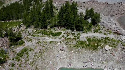 Aerial Shot pull back from close view of some trekkers to pano view Stock Footage 159144893