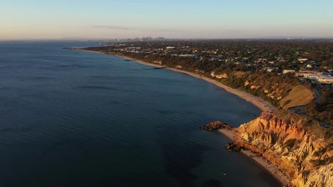 Aerial Shot -  pull back high to reveal Half moon bay. Stock Footage 103489582
