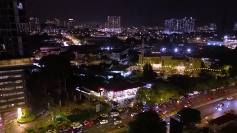 Aerial shot pulling away from a vibrant car tuning event at night Stock Footage 307209497