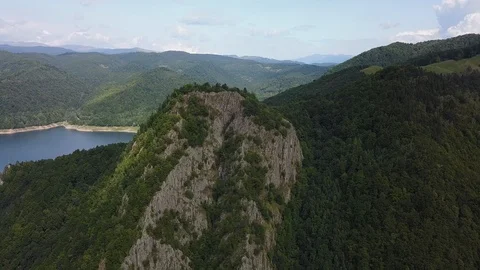 Aerial Shot Pulling Back From Mountain and Lake 스톡 동영상 101216232