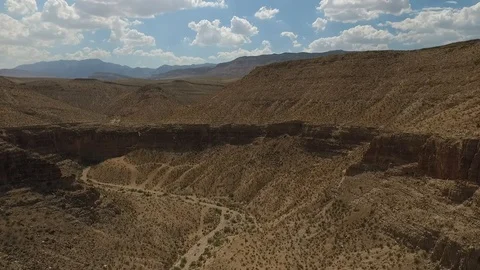 Aerial shot pulling back from mountains Stock Footage 88568298