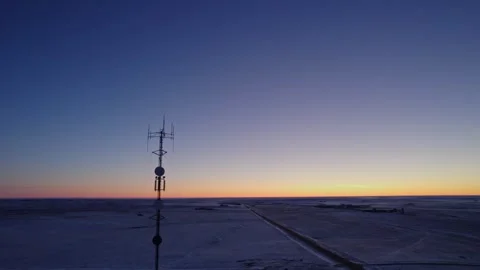 Aerial shot pulling back reveiling Cell Tower Stock Footage 264510624