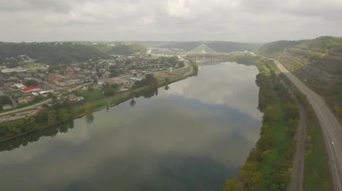 Aerial Shot Pulling Back from Steubenville OH and the Suspension Bridge on the O Stock Footage 57791898