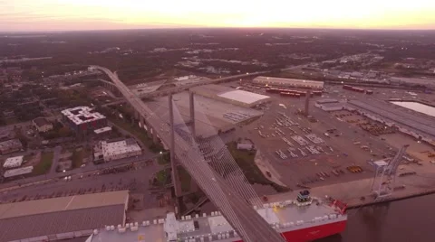 Aerial Shot Pulling Back from the Suspension Bridge in Savannah, GA at Sunset Stock Footage 57714811