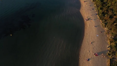 Aerial Shot  - Push to over beach to reveal the City Of Melbourne Stock Footage 103489447