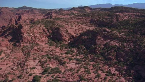 Aerial shot of red cliffs and mountains st george utah Stock Footage 75172813