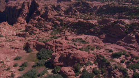 Aerial shot of red cliffs and mountains st george utah Stock Footage 75172860