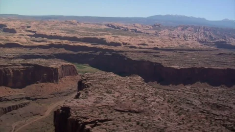 Aerial shot of red rock cliffs and colorado river Stock Footage 75172941
