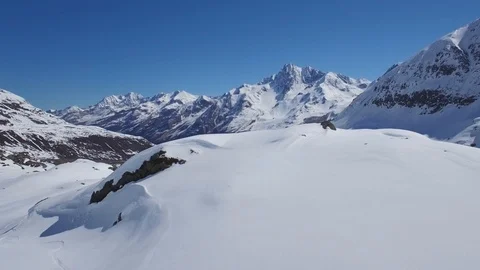 Aerial shot revealing ski snow resort in Kaunertal Austria with mountain range Stock Footage