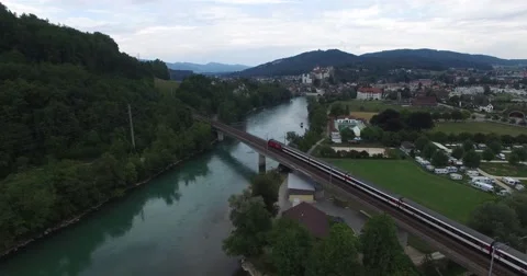 Aerial shot of River, Bridge and Train Stock Footage