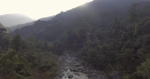 Aerial shot of a river valley surrounded by mountains Stock Footage 142201282
