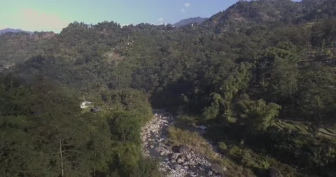 Aerial shot of a river valley surrounded by mountains Stock Footage 142201310
