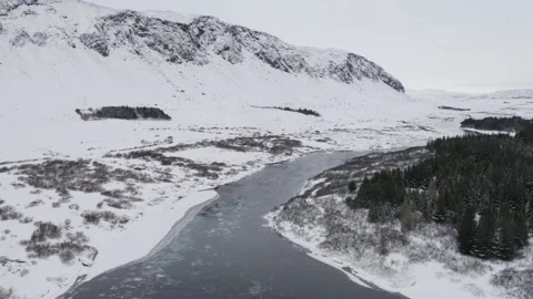 Aerial shot of a river in the winter Video stock 137863398