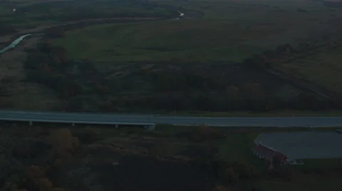 Aerial Shot of Road in Forest in Sunset Light Video stock 62801436
