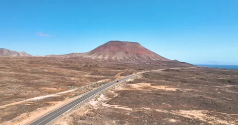 Aerial shot of road running through volcanic landscape, Canary islands Stock Footage 345422175