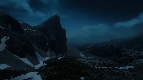 Aerial shot rocket launch towards a mountain at night with stars Stock Footage 100985744