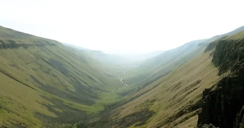 Aerial shot of rocky pillars at High cup Nick 動画素材 331617543