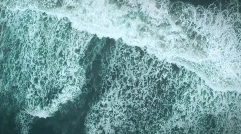 Aerial shot of rolling ocean waves Stock Footage 54562039