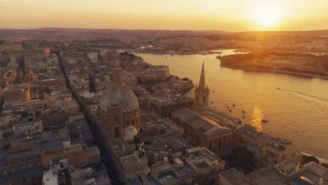 Aerial shot rotating around an iconic Dome in Valletta Malta Stock Footage 90702287