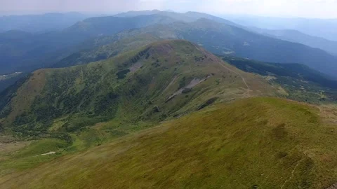 Aerial shot of a rough Carpathian range on a sunny day in summer Stock Footage 86319954
