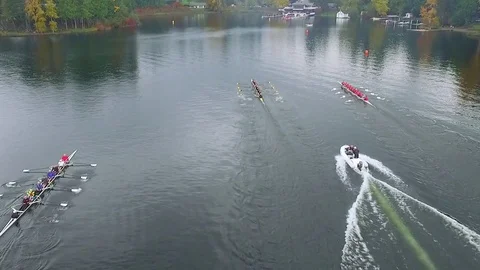 Aerial shot of rowing race between multiple boats on a lake Stock Footage 85193494