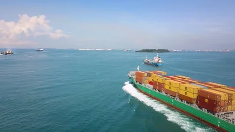Aerial shot of sailing container ship, Singapore Strait Stock Footage 119089110
