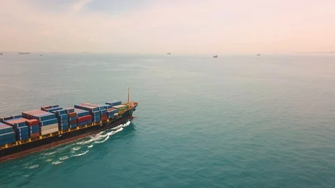 Aerial shot of sailing container ship, Singapore Strait Stock Footage 119089183
