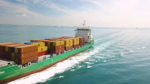 Aerial shot of sailing container ship, Singapore Strait Stock Footage 119089740
