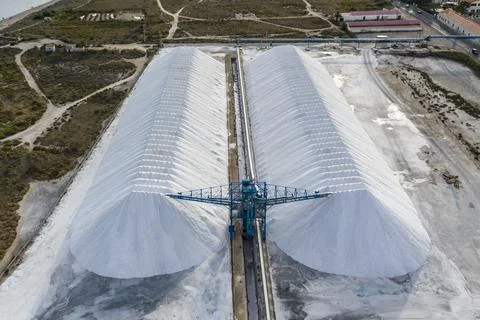 Aerial shot of salt mine processing and heavy production crane. Santa Pola, A Stock Photos