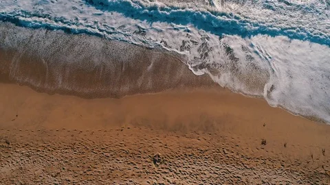 Aerial Shot Of Sandy Beach and Turquoise Ocean Stock Footage 78734193