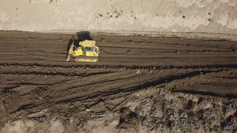 Aerial shot of the scraper machine Видео 152022294