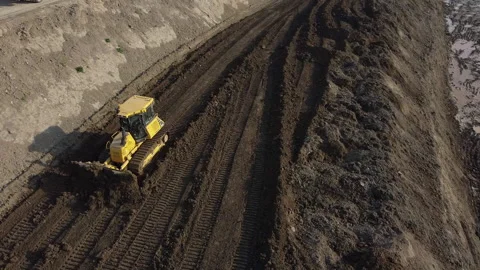 Aerial shot of the scraper machine Stock Footage 152073397