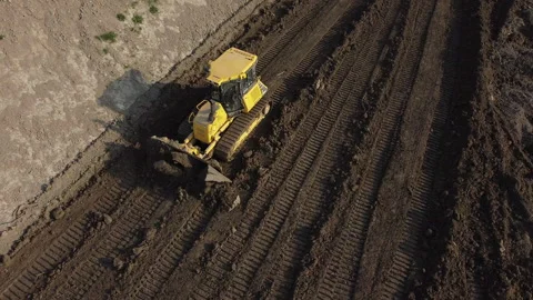 Aerial shot of the scraper machine Видео 152073478